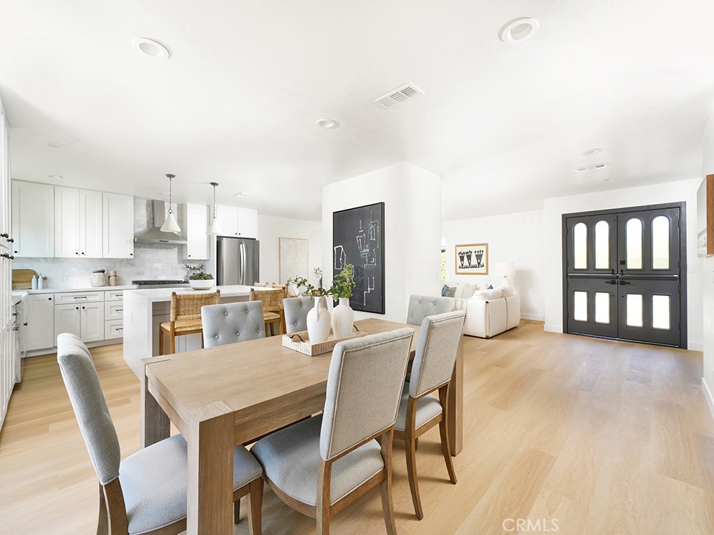 33271 Ocean Hill Drive Dana Point, CA 92629 - Photo 20 of 43 a view of a dining room with furniture and wooden floor