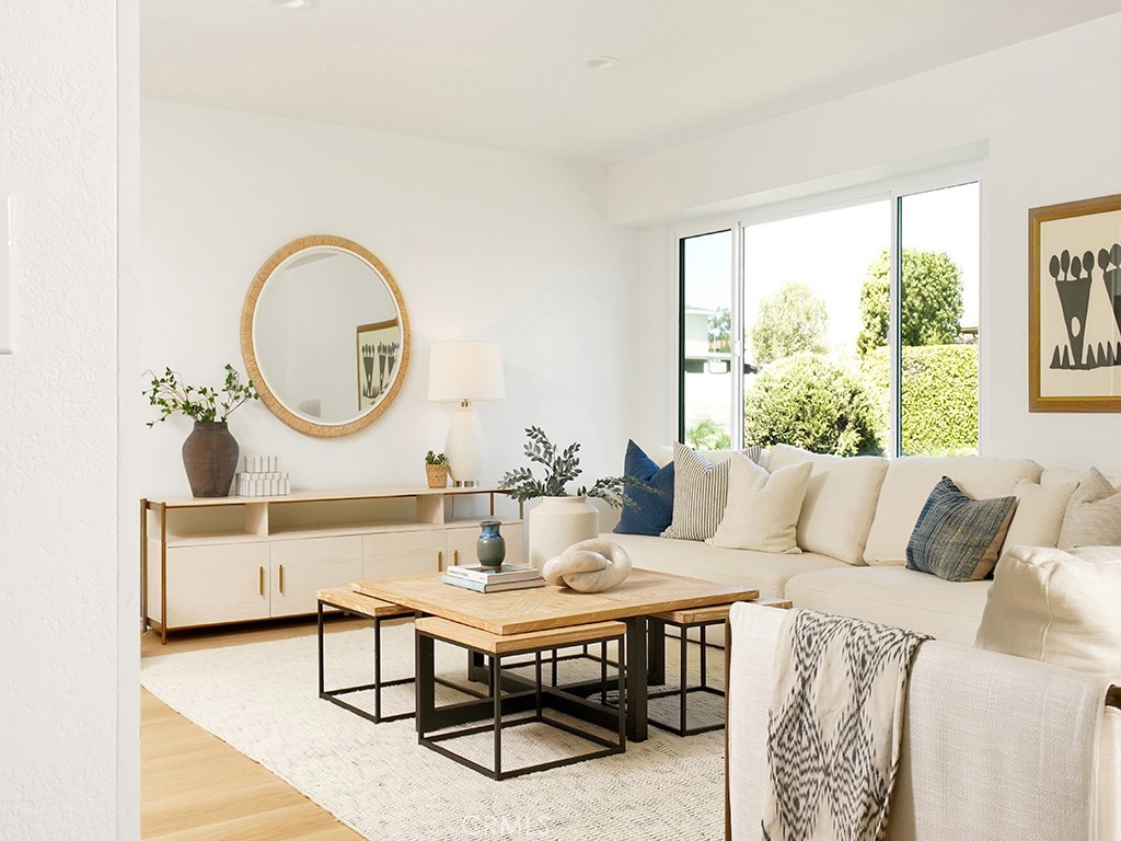 33271 Ocean Hill Drive Dana Point, CA 92629 - Photo 21 of 43 a living room with furniture a window and a table