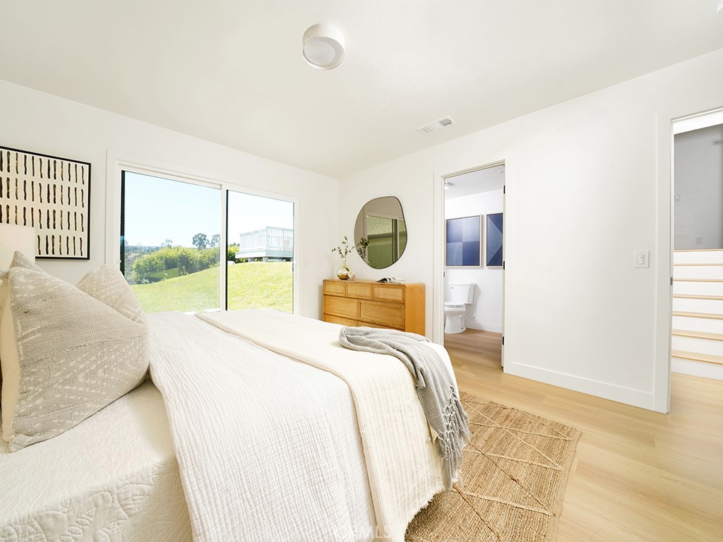 33271 Ocean Hill Drive Dana Point, CA 92629 - Photo 25 of 43 a bedroom with a bed and a large window