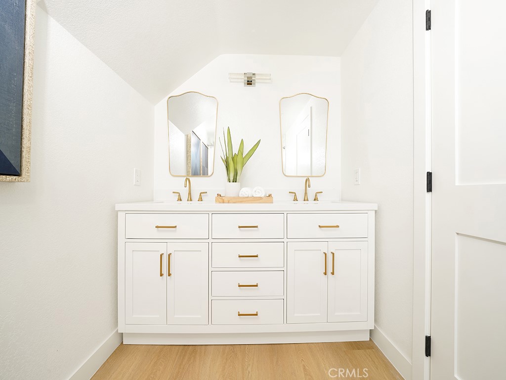 33271 Ocean Hill Drive Dana Point, CA 92629 - Photo 27 of 43 a bathroom with a sink vanity and a mirror