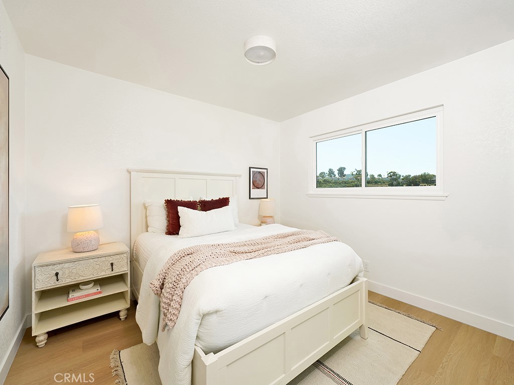 33271 Ocean Hill Drive Dana Point, CA 92629 - Photo 28 of 43 a bedroom with a bed and a window