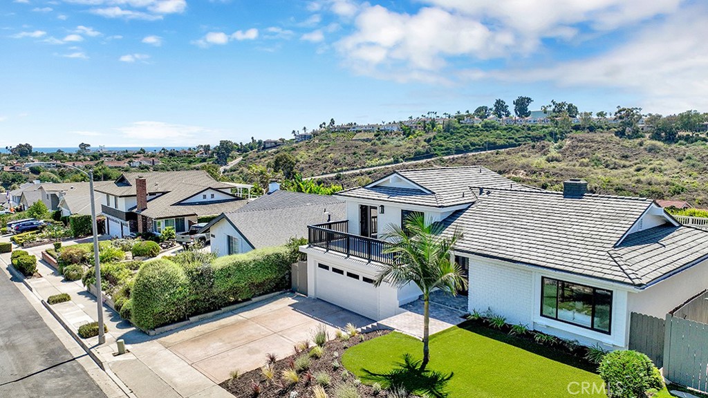 33271 Ocean Hill Drive Dana Point, CA 92629 - Photo 3 of 43 an aerial view of a house with a garden