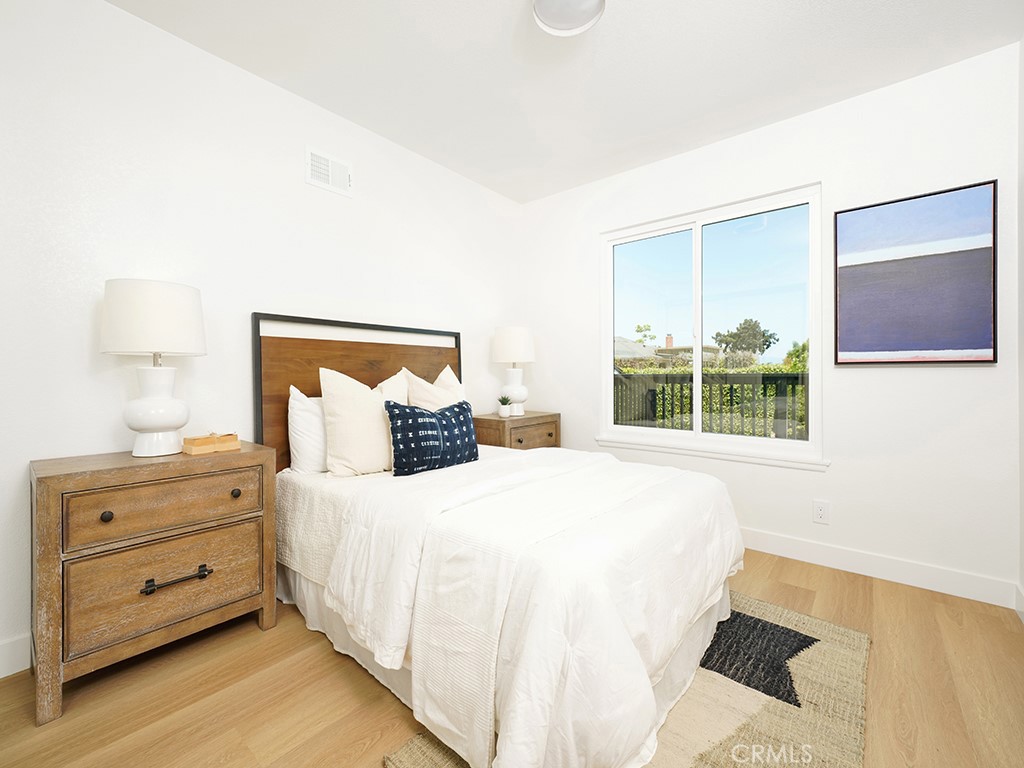 33271 Ocean Hill Drive Dana Point, CA 92629 - Photo 31 of 43 a bedroom with a bed and a window