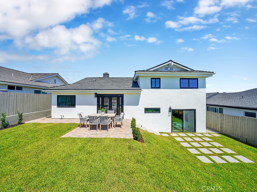33271 Ocean Hill Drive Dana Point, CA 92629 - Photo 36 of 43 a front view of a house with a garden and yard