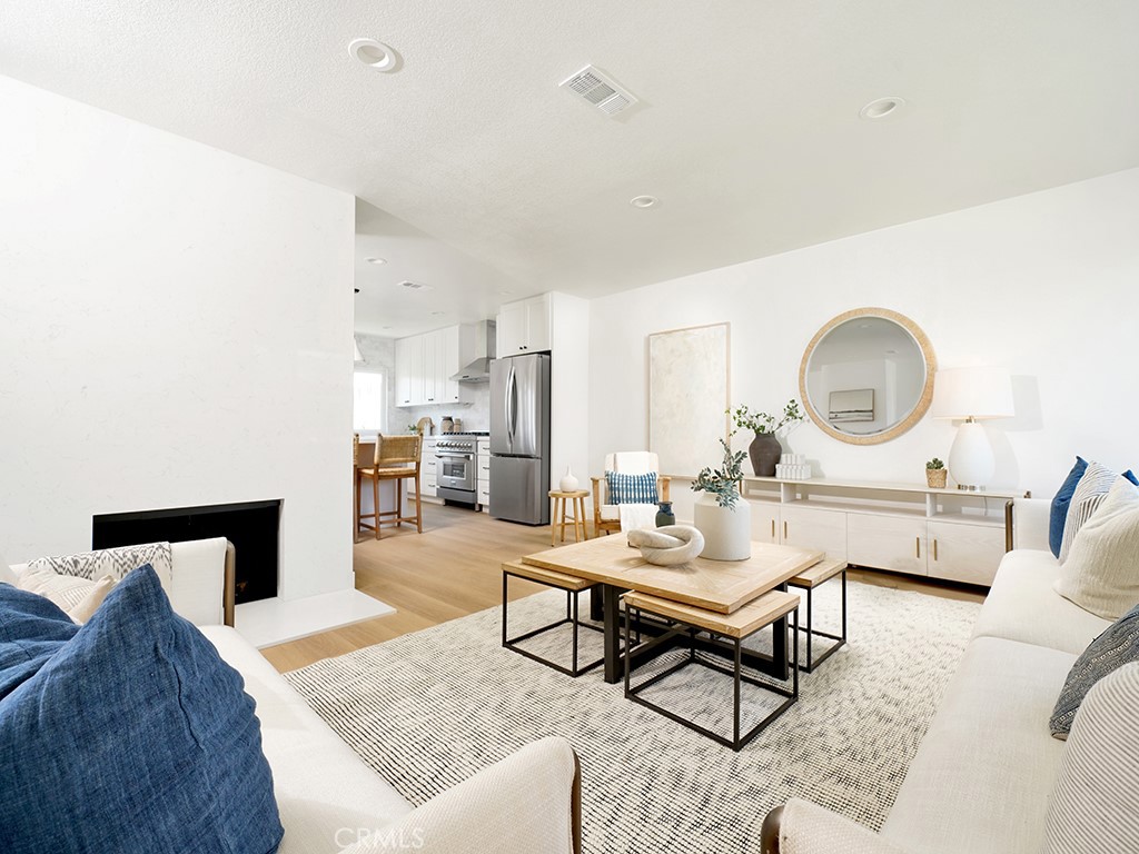 33271 Ocean Hill Drive Dana Point, CA 92629 - Photo 6 of 43 a living room with furniture a mirror and a table
