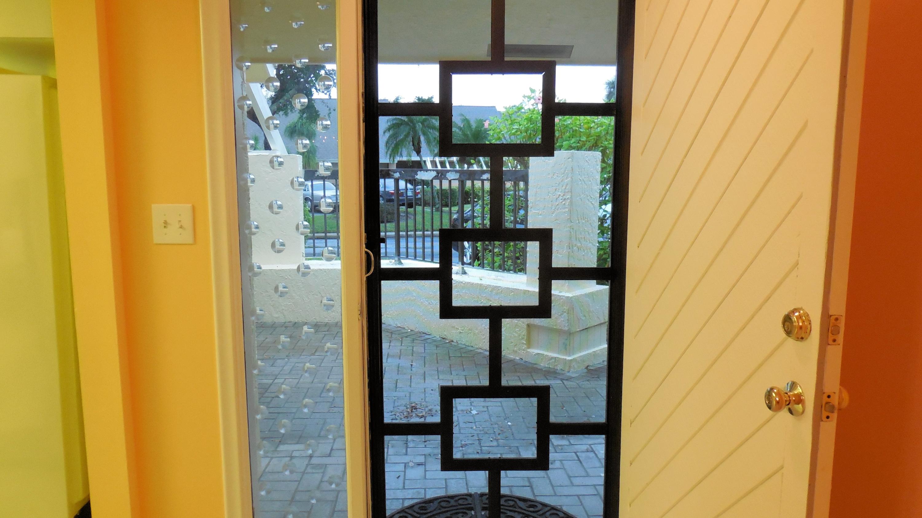 10979 Water Oak Manor Boca Raton, FL 33498 - Photo 17 of 27 FRONT DOOR