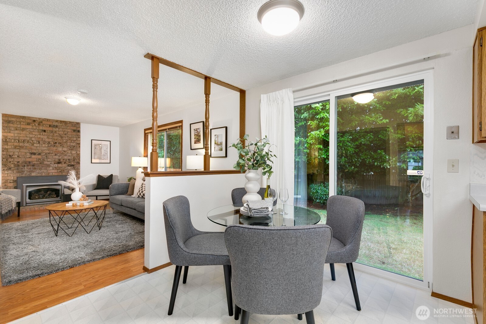 12903 Southeast 160th Street Renton, WA 98058 - Photo 12 of 24 a living room with furniture and a large window