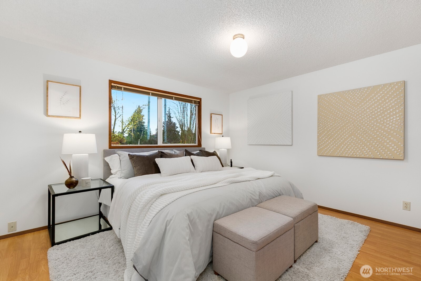 12903 Southeast 160th Street Renton, WA 98058 - Photo 15 of 24 a bedroom with a bed and a large window