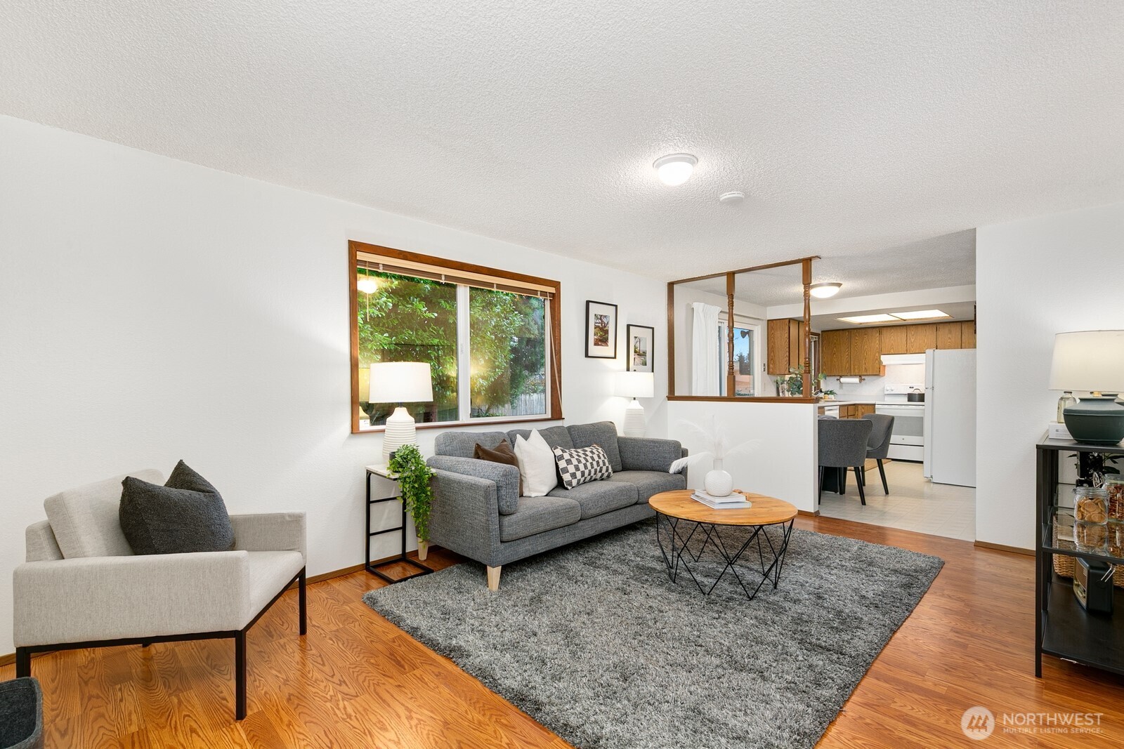 12903 Southeast 160th Street Renton, WA 98058 - Photo 9 of 24 a living room with furniture and a couch