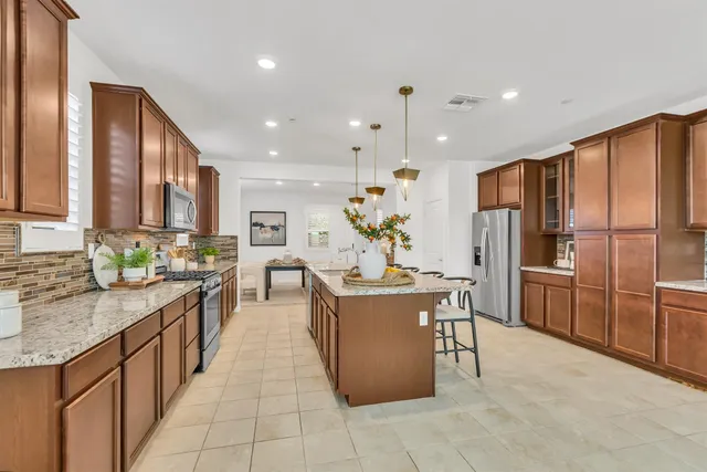 a kitchen with granite countertop lots of counter top space