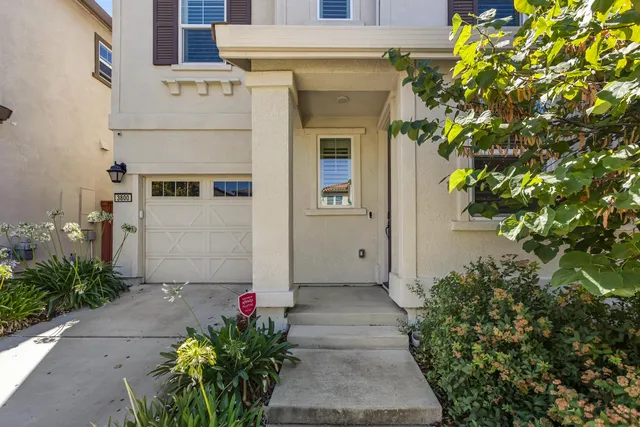 a front view of a house with an outdoor space