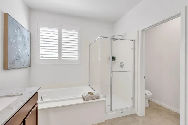 an aerial view of a houses with outdoor space