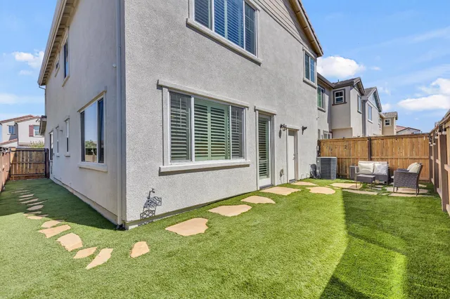 a picture of a park with a bench