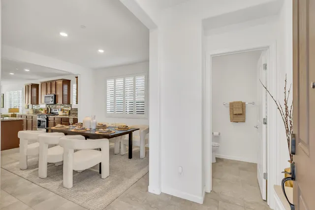 a view of a livingroom with furniture and window
