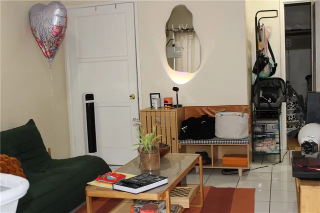 a bathroom with a bathtub and a window