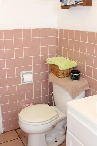 a bathroom with a sink vanity and a mirror