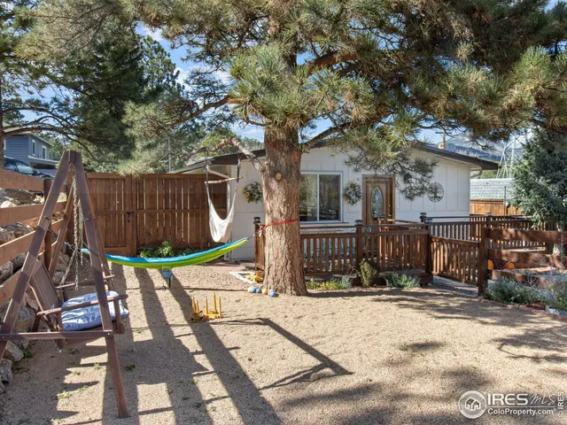 a view of a hallway with washer and dryer