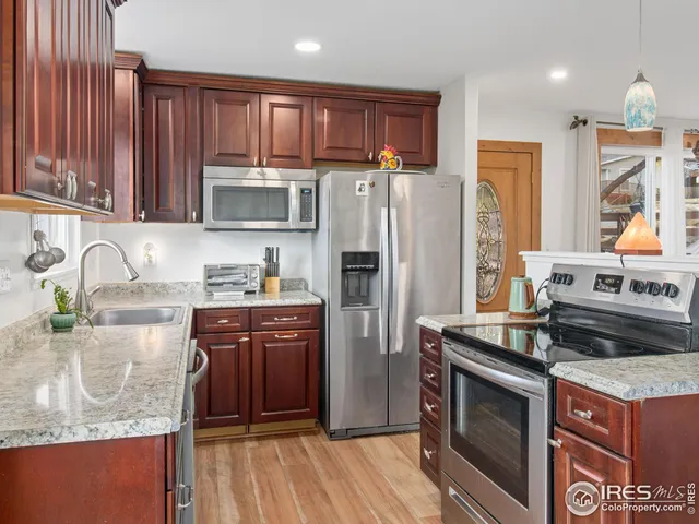 a view of house with outdoor seating area