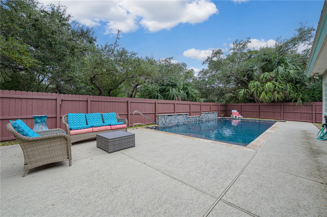 610 Bent Tree Street Rockport, TX 78382 - Photo 15 of 40 a view of sitting area with furniture and wooden fence
