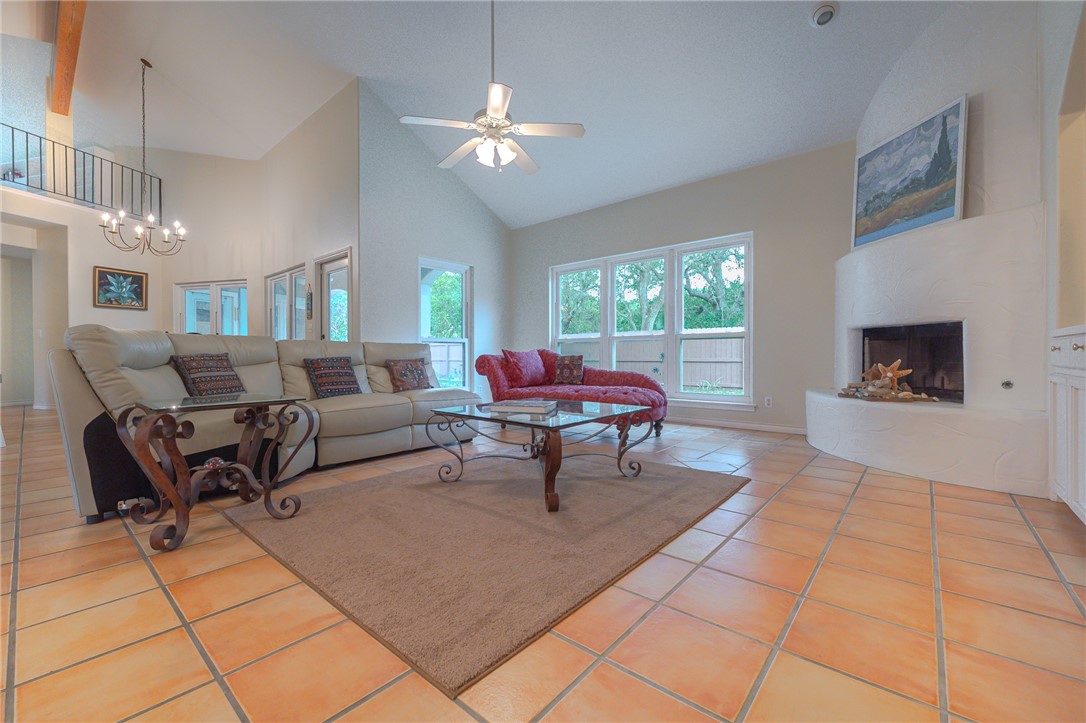 610 Bent Tree Street Rockport, TX 78382 - Photo 16 of 40 a living room with furniture and a fireplace