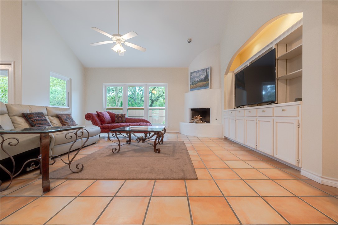 610 Bent Tree Street Rockport, TX 78382 - Photo 18 of 40 a living room with furniture and a flat screen tv