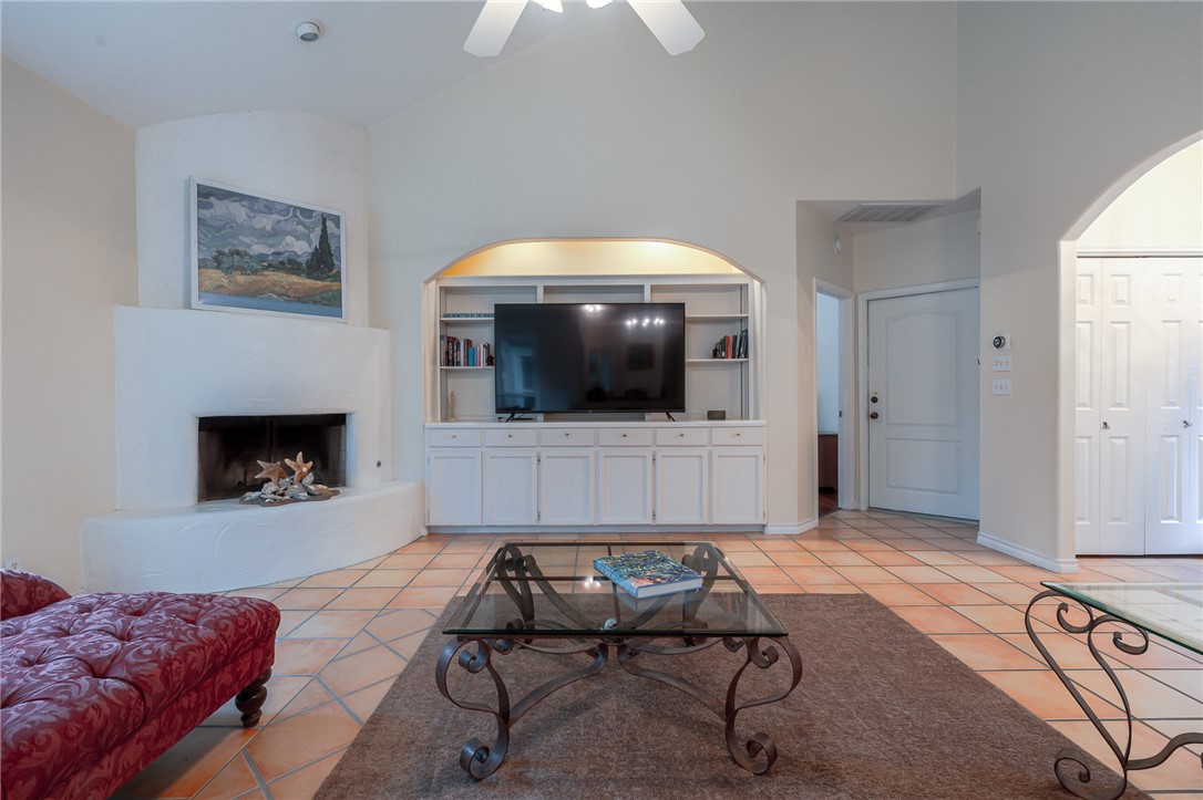 610 Bent Tree Street Rockport, TX 78382 - Photo 19 of 40 a living room with furniture and a fireplace