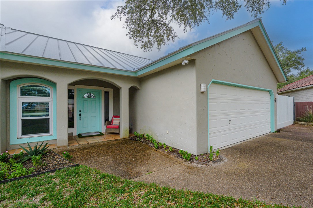 610 Bent Tree Street Rockport, TX 78382 - Photo 3 of 40 a view of a house with wooden walls
