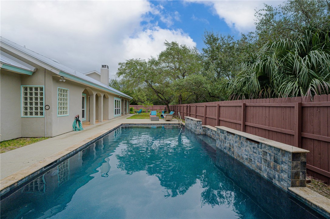 610 Bent Tree Street Rockport, TX 78382 - Photo 10 of 40 a view of a balcony with wooden floor