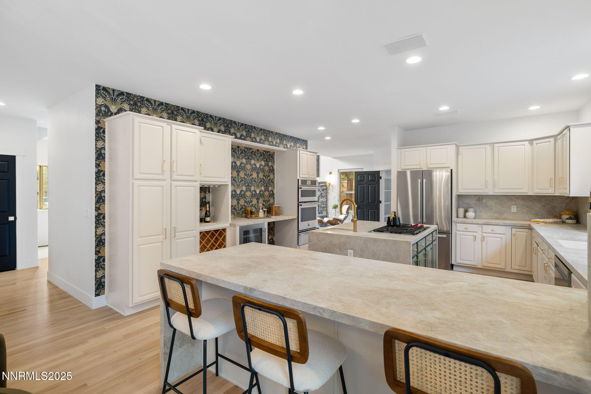 16435 Snow Flower Drive Reno, NV 89511 - Photo 12 of 48 a large kitchen with kitchen island a table and chairs
