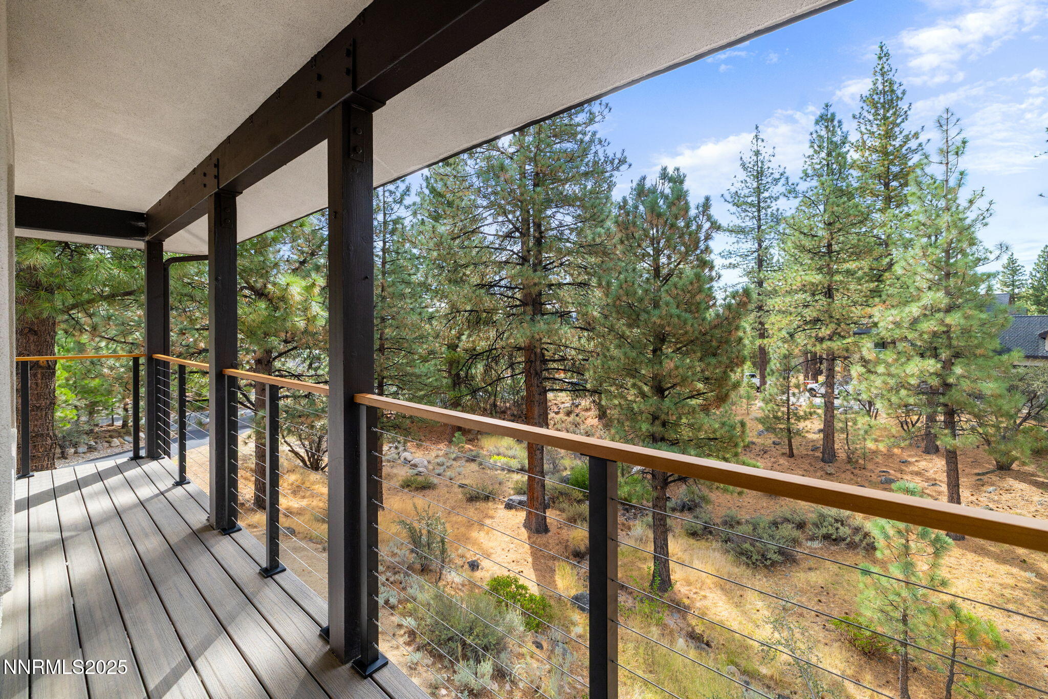 16435 Snow Flower Drive Reno, NV 89511 - Photo 23 of 48 a view of balcony with wooden floor