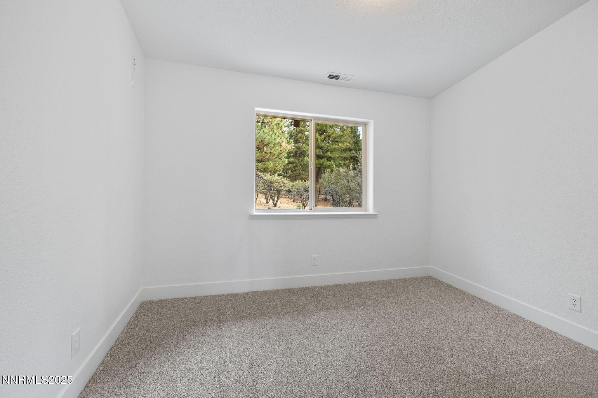16435 Snow Flower Drive Reno, NV 89511 - Photo 27 of 48 an empty room with a window