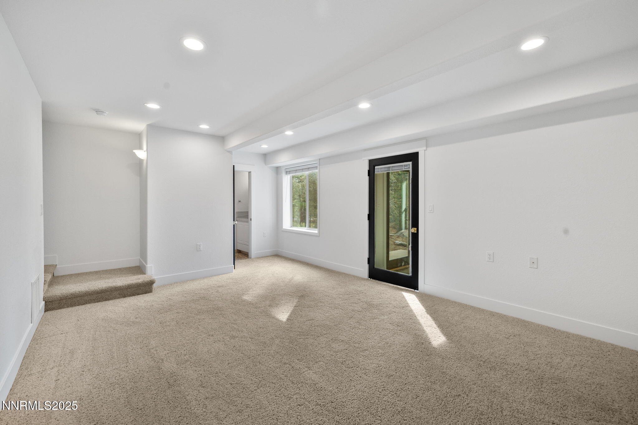 16435 Snow Flower Drive Reno, NV 89511 - Photo 31 of 48 a view of an empty room with window and closet area