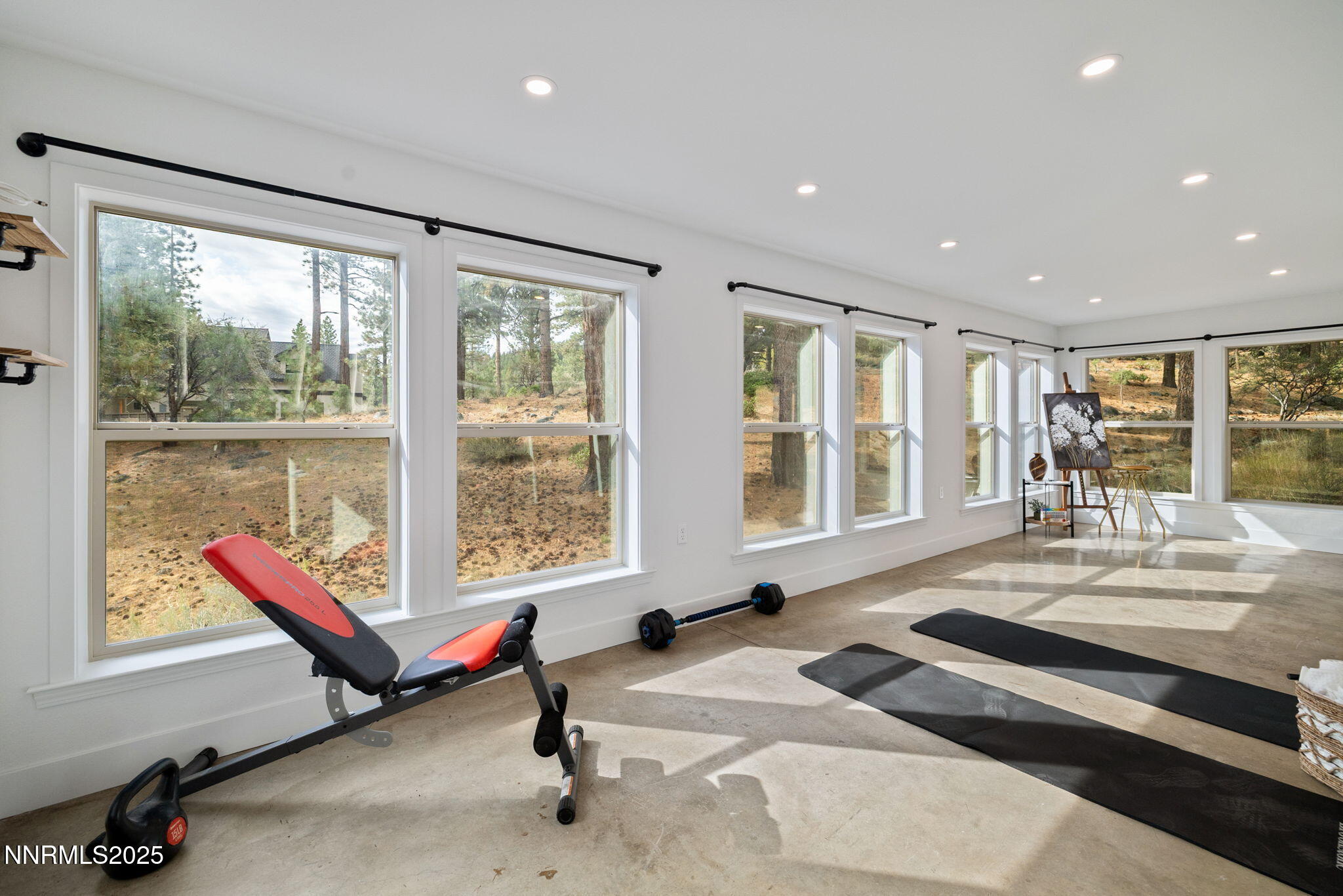 16435 Snow Flower Drive Reno, NV 89511 - Photo 35 of 48 a living room with furniture pool table and a large window