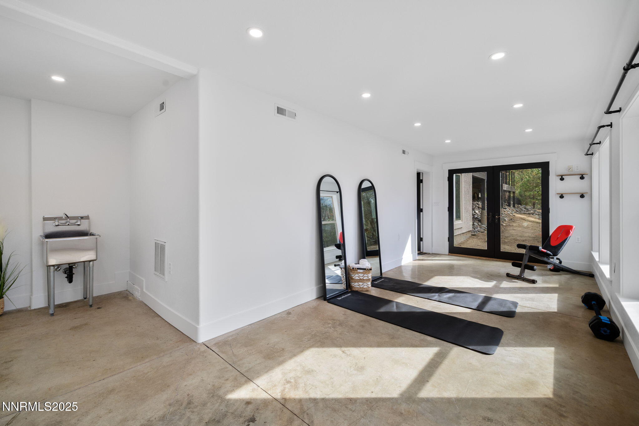 16435 Snow Flower Drive Reno, NV 89511 - Photo 36 of 48 a living room with furniture and a fireplace