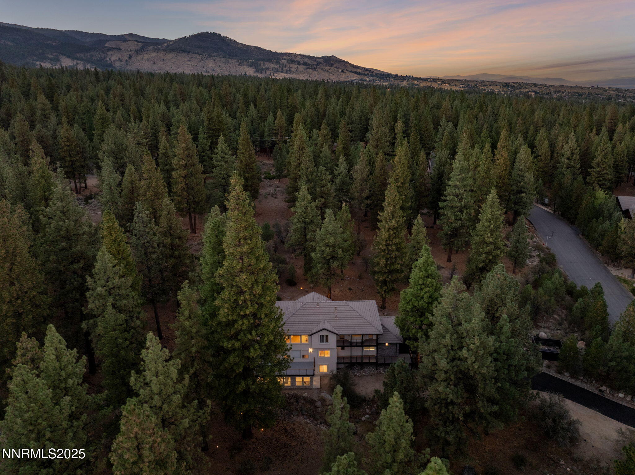 16435 Snow Flower Drive Reno, NV 89511 - Photo 45 of 48 a view of a city with lush green forest