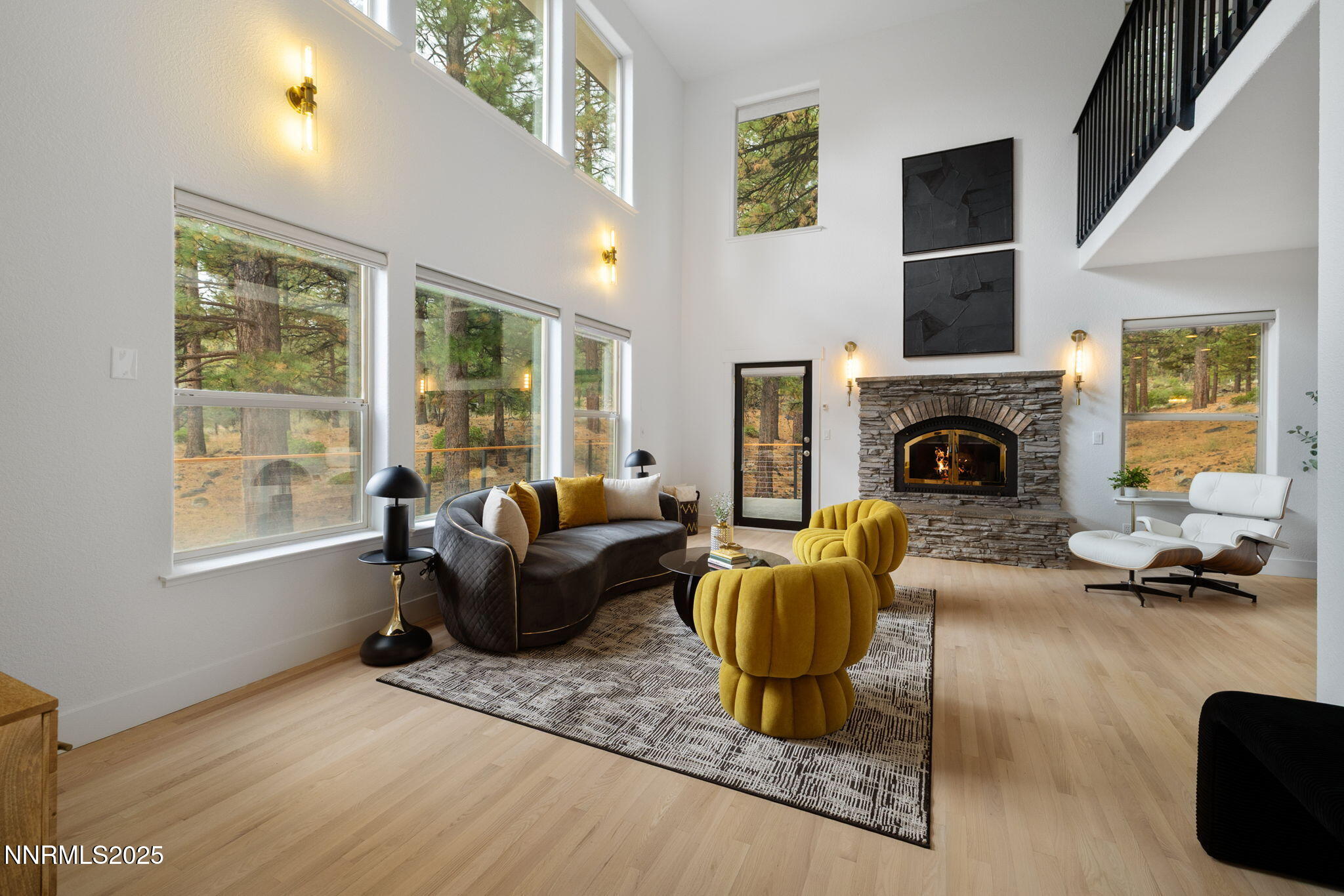 16435 Snow Flower Drive Reno, NV 89511 - Photo 5 of 48 a living room with furniture or couch and a fireplace