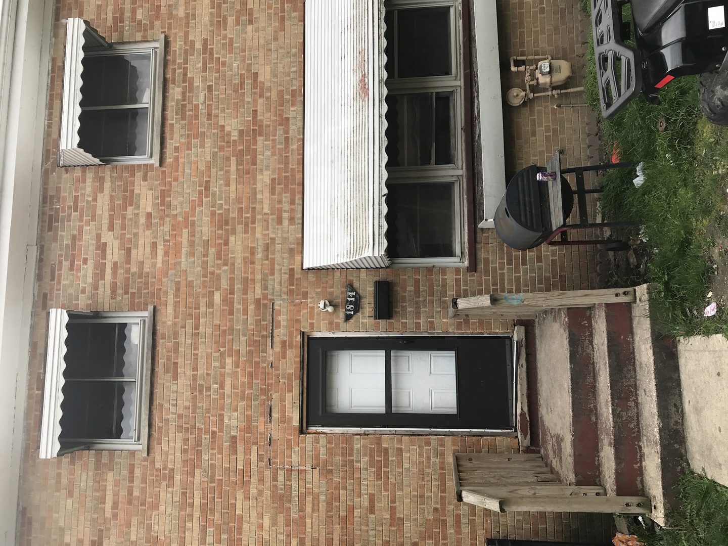 Undisclosed Address Chicago, IL 60623 - Photo 2 of 8 a front view of a house with stairs