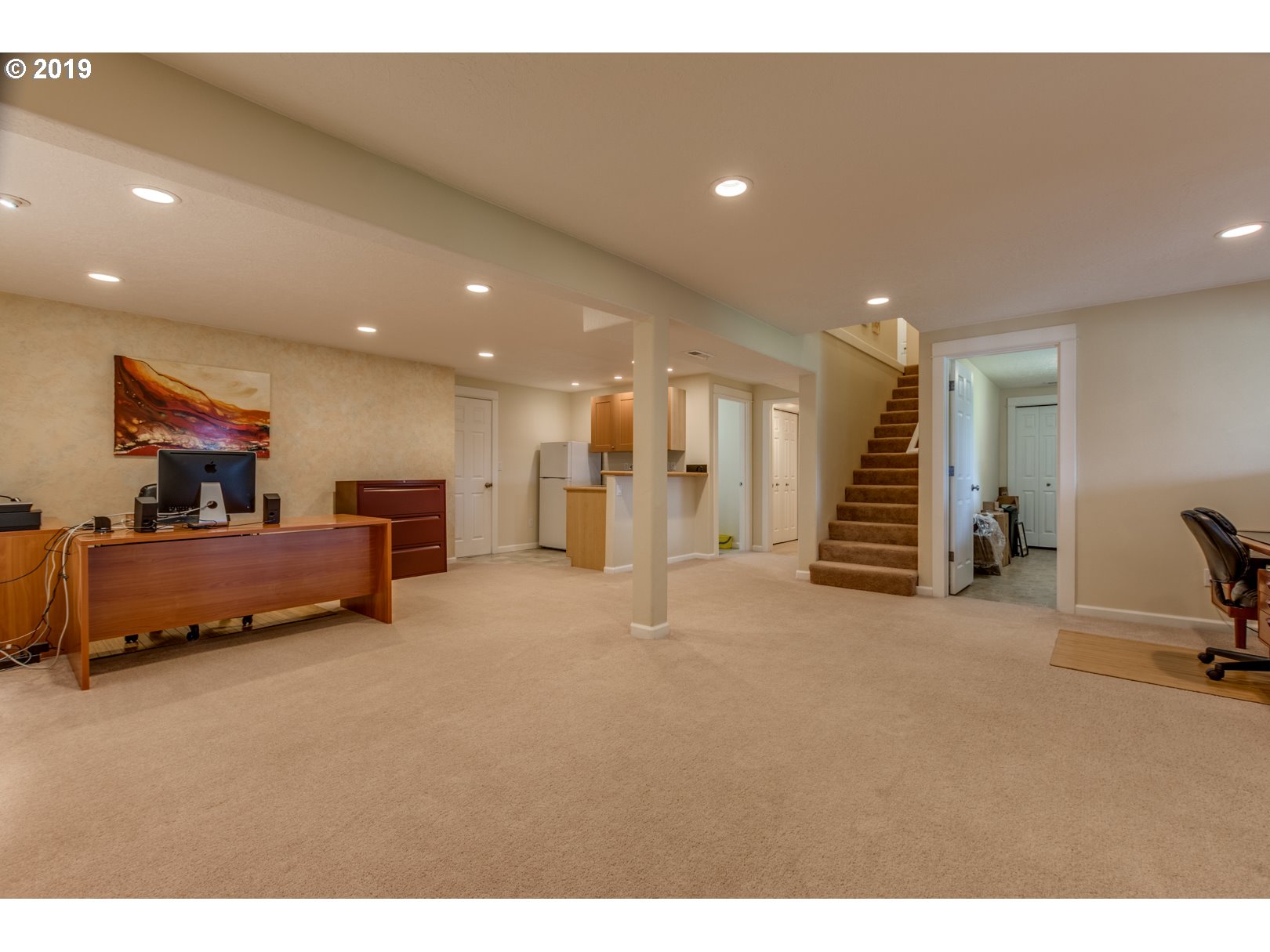 5859 Southwest Oleson Road Portland, OR 97225 - Photo 17 of 32 a living room with furniture and a flat screen tv