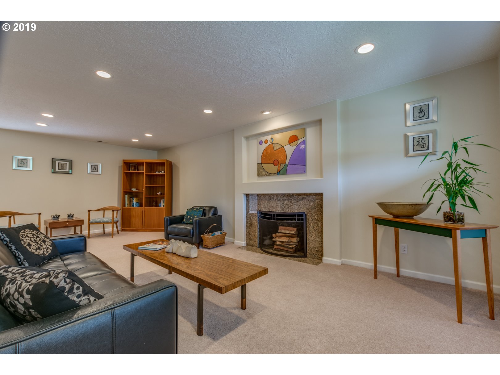 5859 Southwest Oleson Road Portland, OR 97225 - Photo 4 of 32 a living room with furniture and a fireplace