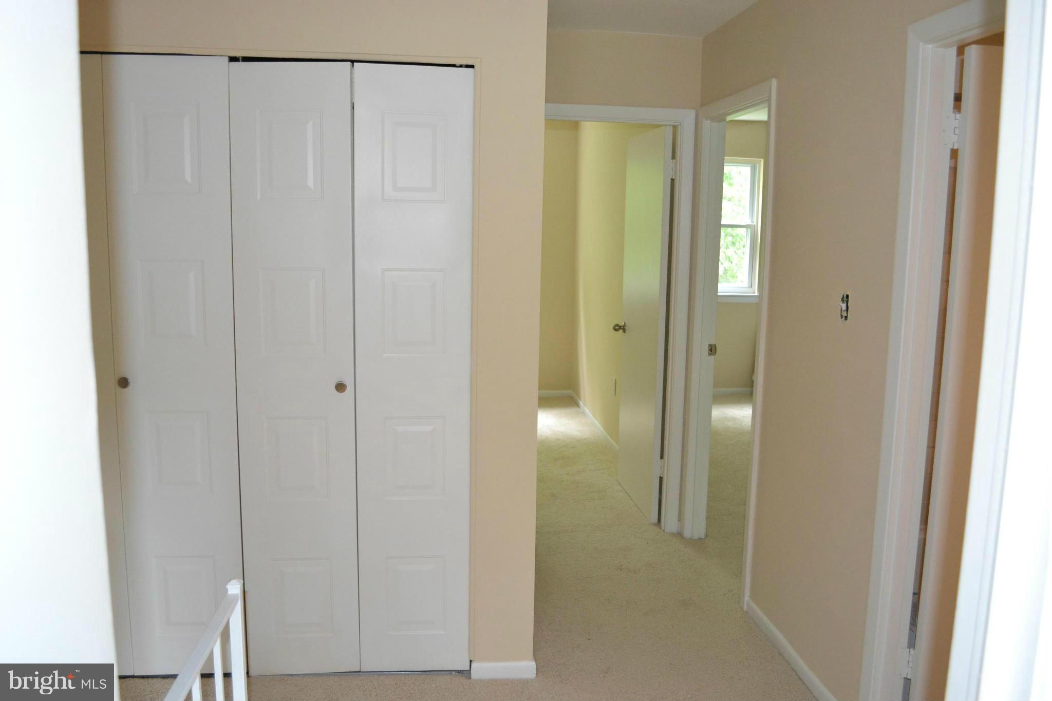9353 Pan Ridge Road Baltimore, MD 21234 - Photo 14 of 23 Hallway to 3 Bedrooms