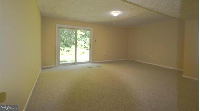 9353 Pan Ridge Road Baltimore, MD 21234 - Photo 20 of 23 Family Room with WALKOUT