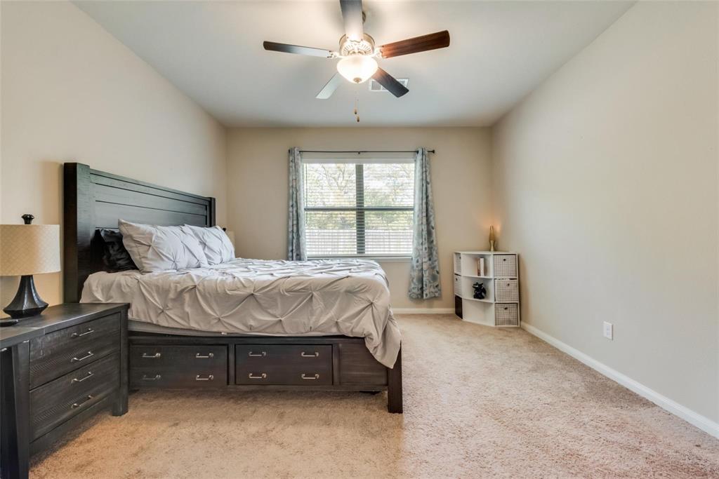 2213 Georgetown Street Princeton, TX 75407 - Photo 18 of 25 Bedroom featuring light carpet and ceiling fan