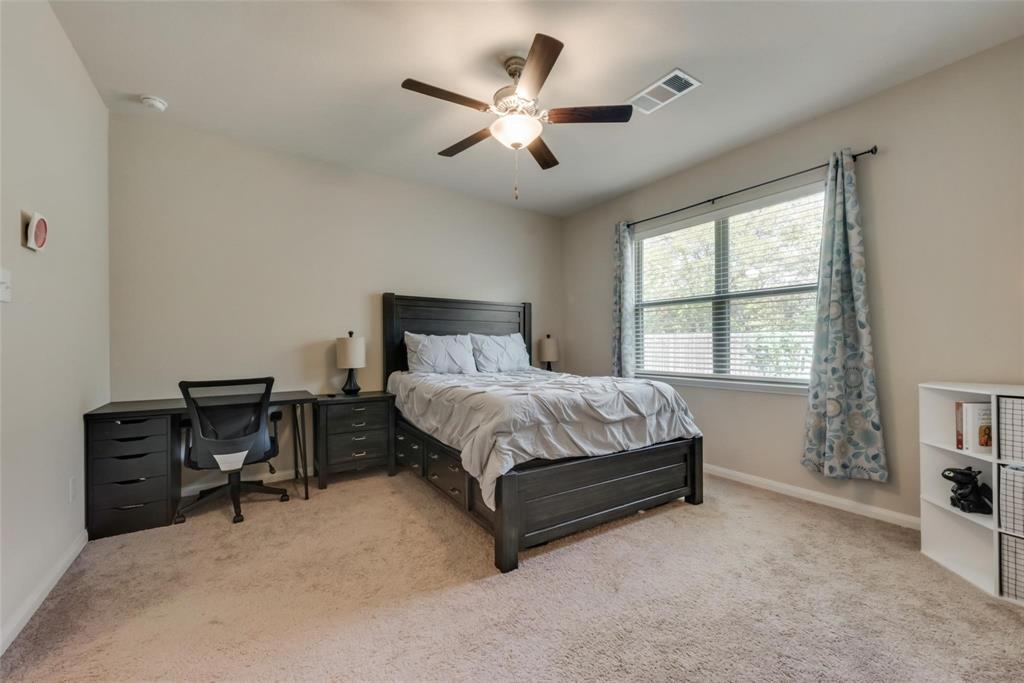 2213 Georgetown Street Princeton, TX 75407 - Photo 20 of 25 Carpeted bedroom featuring a ceiling fan and an office area