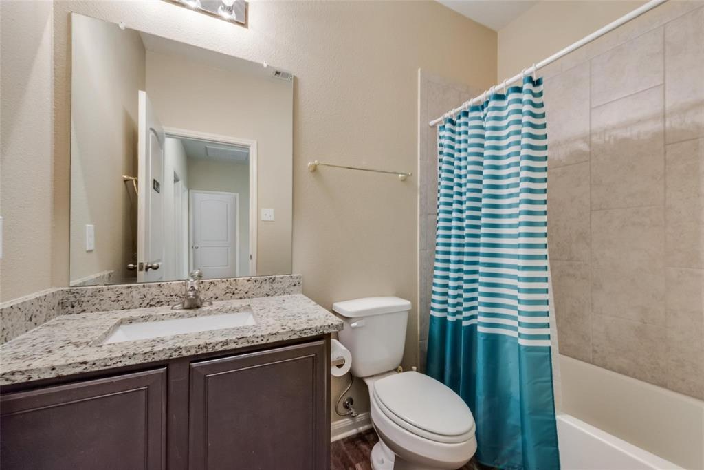 2213 Georgetown Street Princeton, TX 75407 - Photo 23 of 25 Bathroom featuring shower / tub combo with curtain and vanity