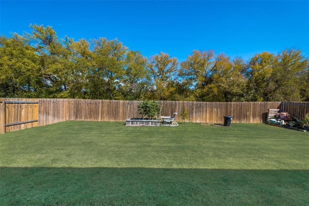 2213 Georgetown Street Princeton, TX 75407 - Photo 24 of 25 View of fenced backyard