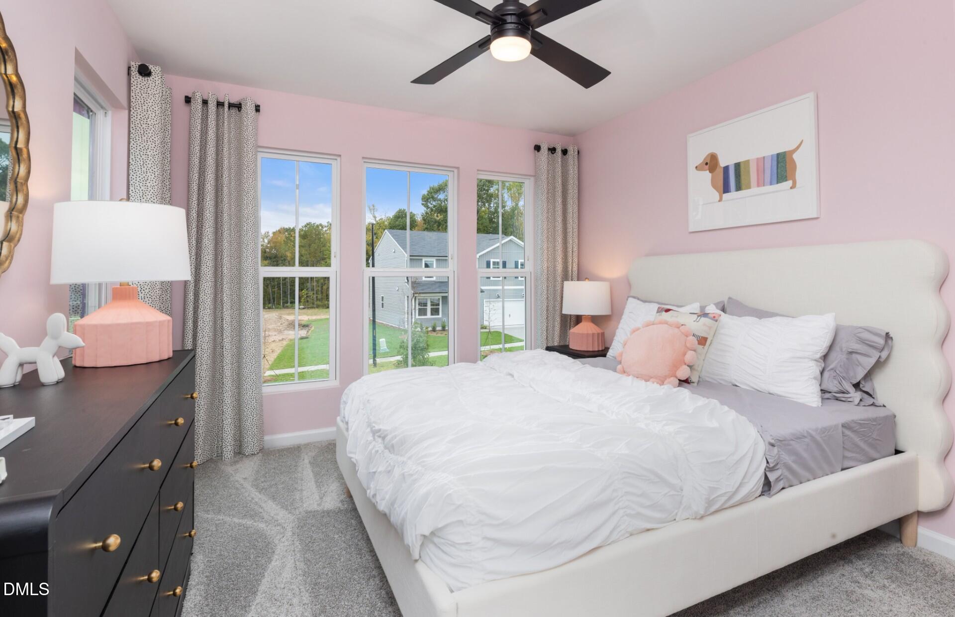 3034 Hammer Creek Road Durham, NC 27704 - Photo 15 of 19 a bedroom with a bed and window