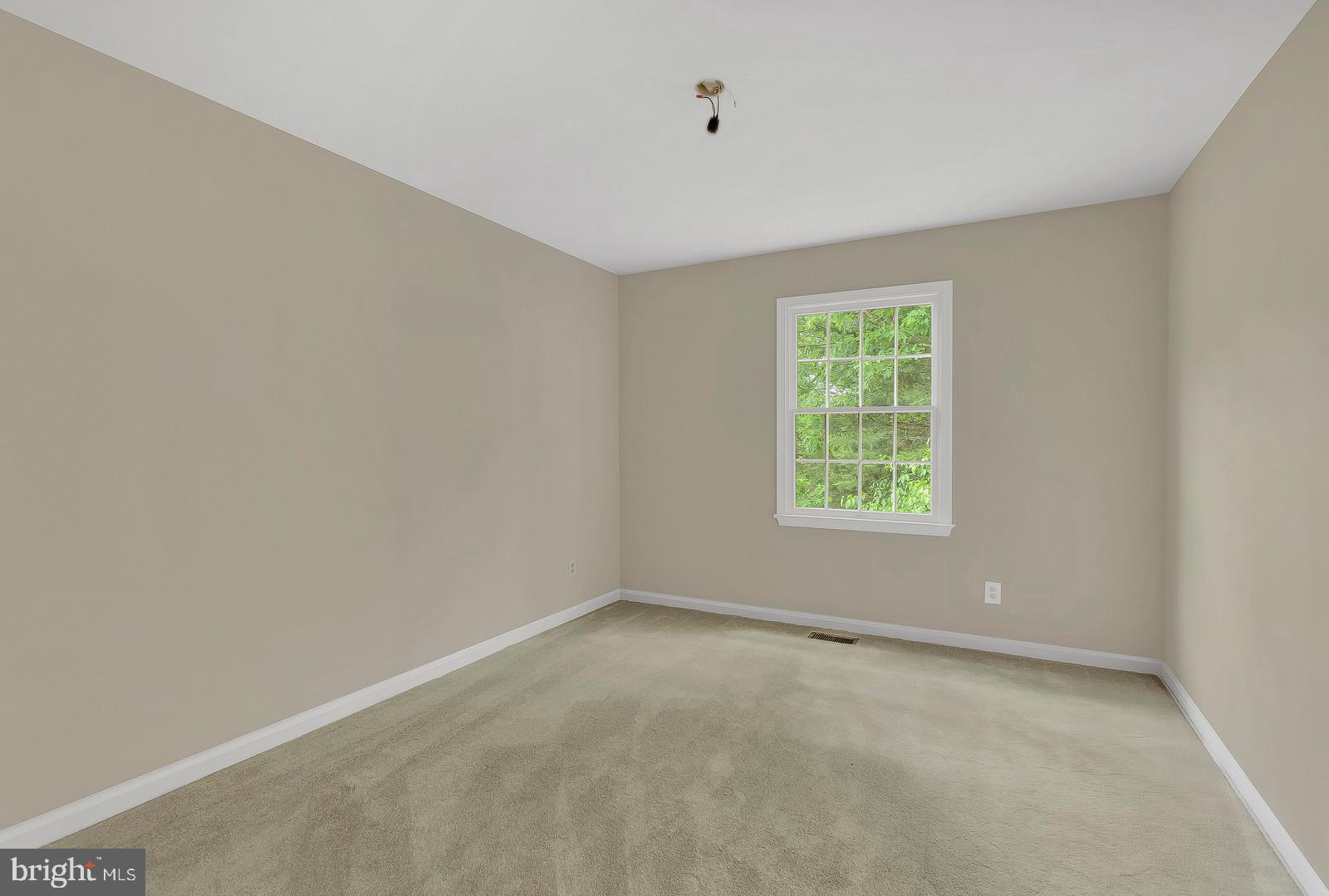 1010 Planters Wharf Road Lusby, MD 20657 - Photo 19 of 26 Upper level bedroom #2 w/new carpets
