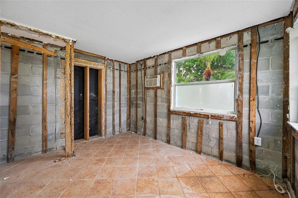 14111 West Parsley Drive Madeira Beach, FL 33708 - Photo 29 of 99 a view of a room with a large window