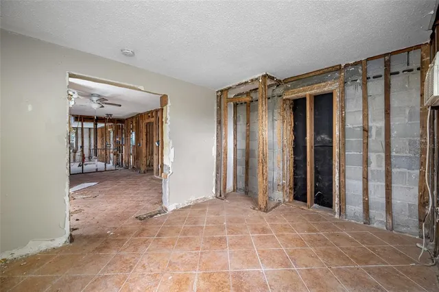 a bathroom with a sink toilet vanity and shower