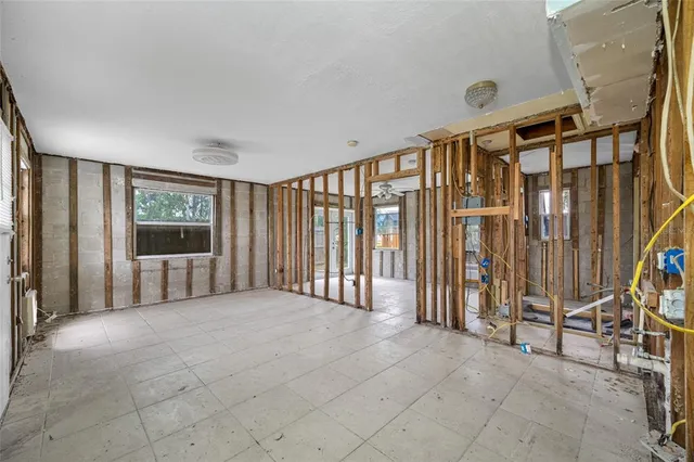 a kitchen with a sink stove and refrigerator